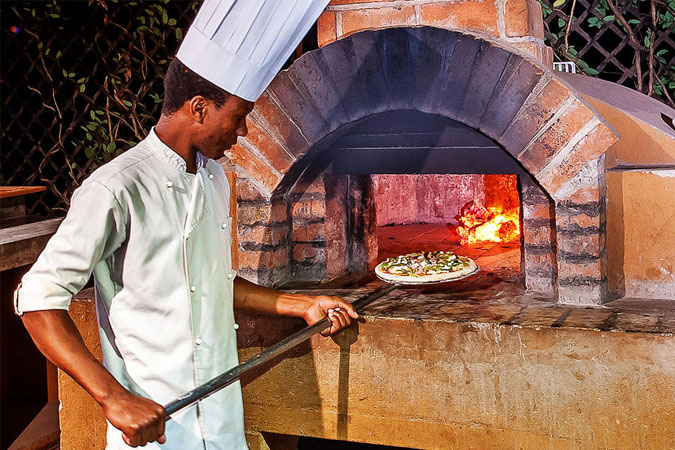 Wood fired pizza oven at ‘3 Degrees South’ - Elewana Arusha Coffee Lodge